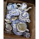 A box of various blue and white china