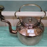 An early 19th Century seamed copper kettle with C scroll handle
