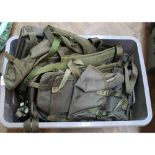 Three boxes of various military items including webbing,