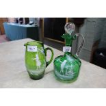 A Mary Gregory green jug and decanter