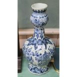 A 19th Century Delft floral onion shaped vase,