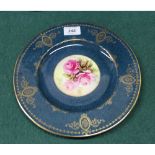 A Royal Worcester powder blue ground rose painted plate, signed T.