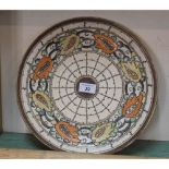 A Crown Ducal tube lined spider web and floral charger in Charlotte Rhead style,