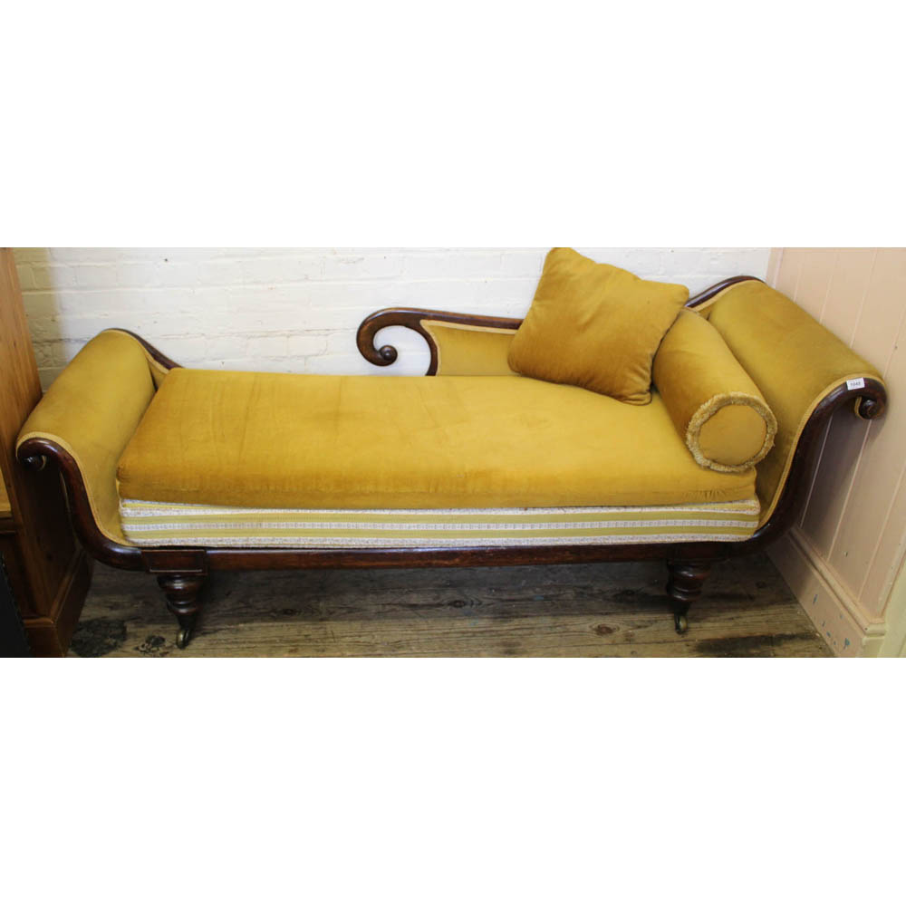 A Victorian mahogany chaise longue and gold velvet upholstery,