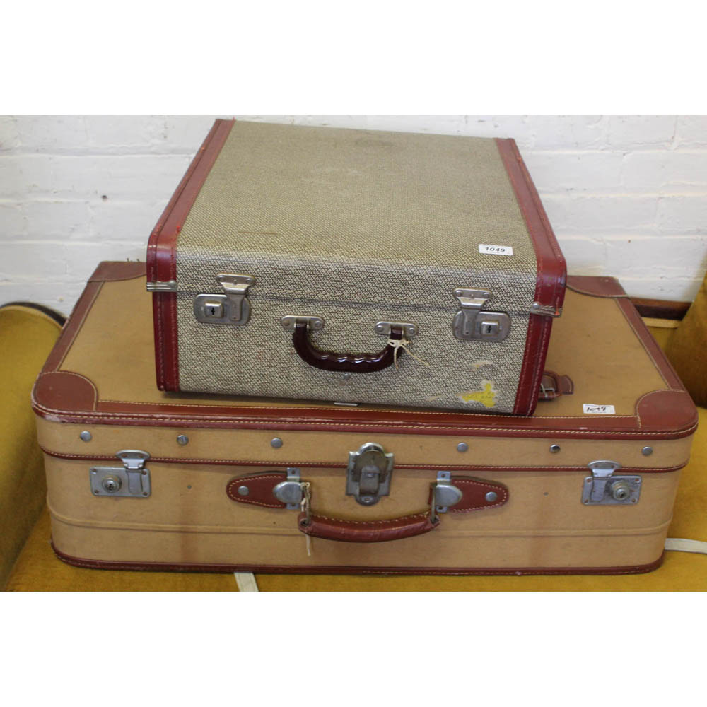 Two large vintage suitcases