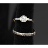 An 18ct platinum set Art Deco style diamond ring plus a white metal half eternity set with small