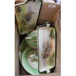 A Clarice Cliff green banded part dinner set plus a pair of Royal Doulton game bird sandwich plates