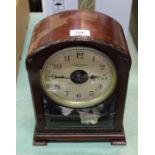 A Bulle electric clock in mahogany case