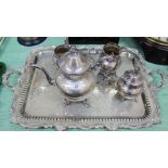 A large silver plated tray plus a four piece tea set