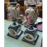 A pair of continental porcelain figure decorated vases on square bases,