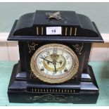 A metal cased ansonia mantel clock