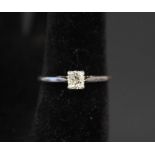 A platinum solitaire diamond ring,