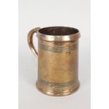 A 19th Century quart brass or gun metal tankard with engraved and reeded decoration