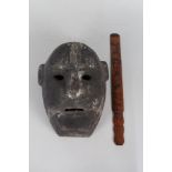 A South Sea Islands wall mask plus a Japanese bamboo paper knife