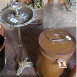 A Victorian copper warming pan, a brass smoking stand, a metal canister,