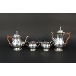 A silver four piece tea set