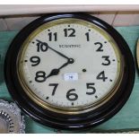 A circular Scientific Clock MFG Co wall clock