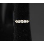 An 18ct gold five stone diamond ring,