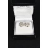 A pair of 18ct gold white gold diamond set cluster earrings, total diamond weight approx 1.