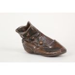 A 19th Century bronze childs shoe