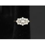 A very attractive 18ct gold diamond cluster ring in the Art Deco style set with baguette and