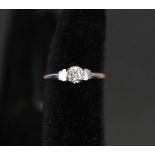 An 18ct platinum set solitaire diamond ring,