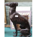 A cast metal whippet,