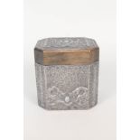 An Arts and Crafts pewter bound wooden tea caddy with raised dragon decoration inset with Ruskin