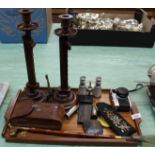 An unusual pair of mahogany ratchet telescopic candlesticks,