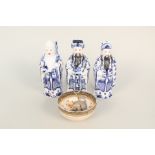 Three Chinese porcelain sages plus a small Satsuma bowl