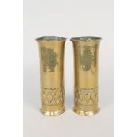 A pair of brass Arts and Crafts cylindrical vases, marked W H Mawson, Keswick,