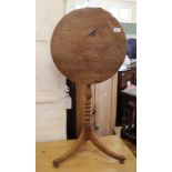 A Victorian mahogany circular tilt top table on tripod base