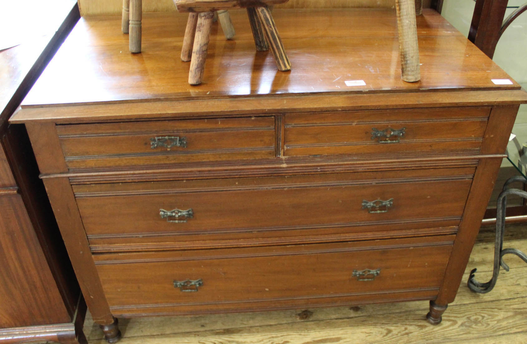 An Edwardian mahogany chest of four drawers and a mahogany china display cabinet