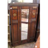 A small 1920's oak single wardrobe