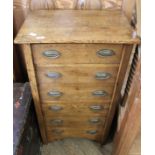 An Edwardian six drawer Wellington chest with original plate handles