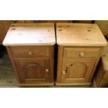 A pair of pine bedside cupboards with single drawer