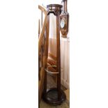 A tall circular Edwardian coat stand