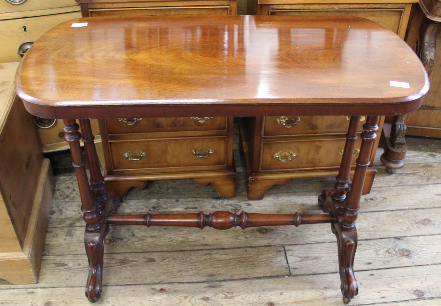 A Victorian mahogany stretcher base table