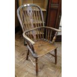 A 19th Century beech and elm high back Windsor armchair