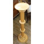 A modern oak style jardiniere stand