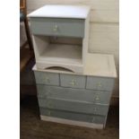 A modern grey and white painted chest of six drawers and matching bedside cabinet