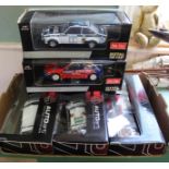 Five boxed large scale rally cars