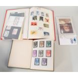Two albums of GB and world stamps,