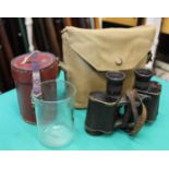 A WWII pair of military binoculars in canvas case with a 'campaign' glass beaker and leather case