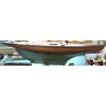 A large model pond yacht and sails