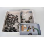 A box containing lead figures by Britains and unknown makes,