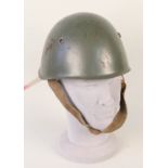 An Italian steel helmet with liner