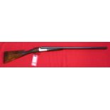 A 12 bore D/B B/L/N/E shotgun with 28" barrels that have clean bores, a classic gun by Darlow & Co,