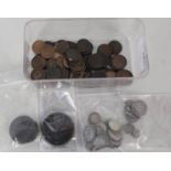 Various coins including silver three pence pieces,