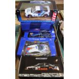 Five various boxed large scale rally cars, Burago,
